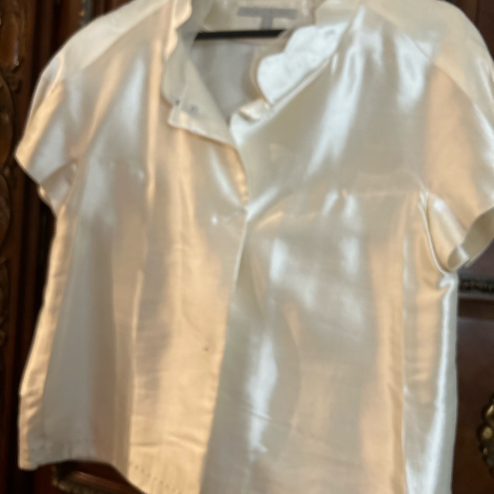 Stunning silk blouse from world famous Taiwanese designer.  Sold in Paris/China.
